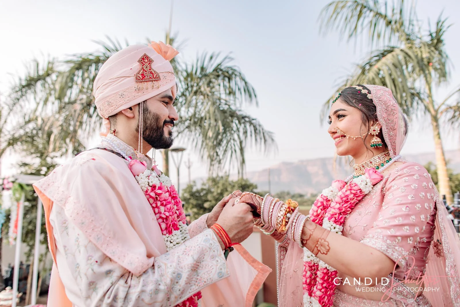 Mrunal and Yash sharing a joyful wedding moment